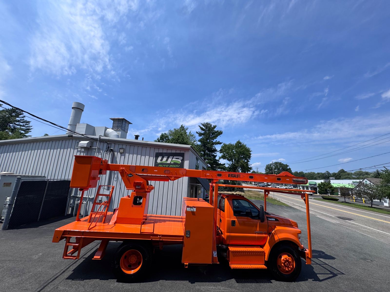 Utility truck refinished after sandblasting and paint